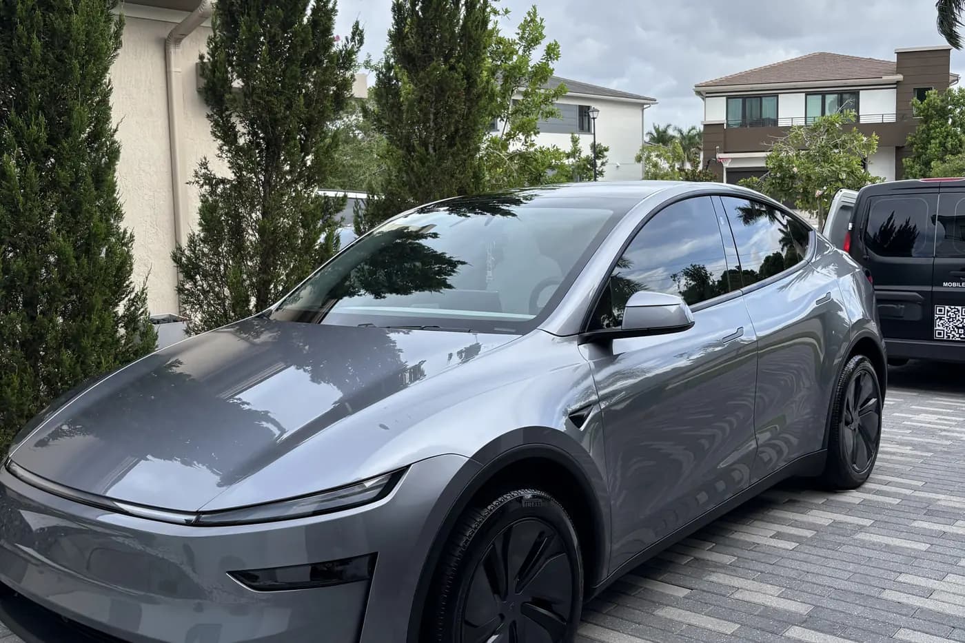 Tesla Model Y detailed in a client's driveway in Broward County
